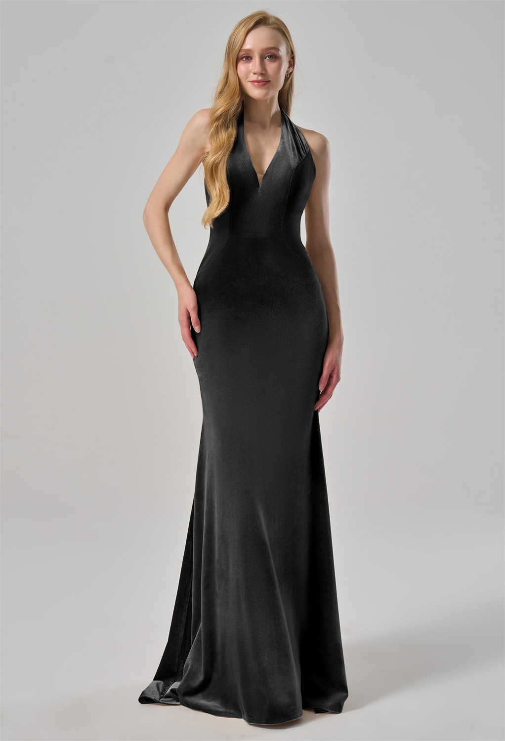 this dress exudes timeless charm. The daring open back adds a modern touch