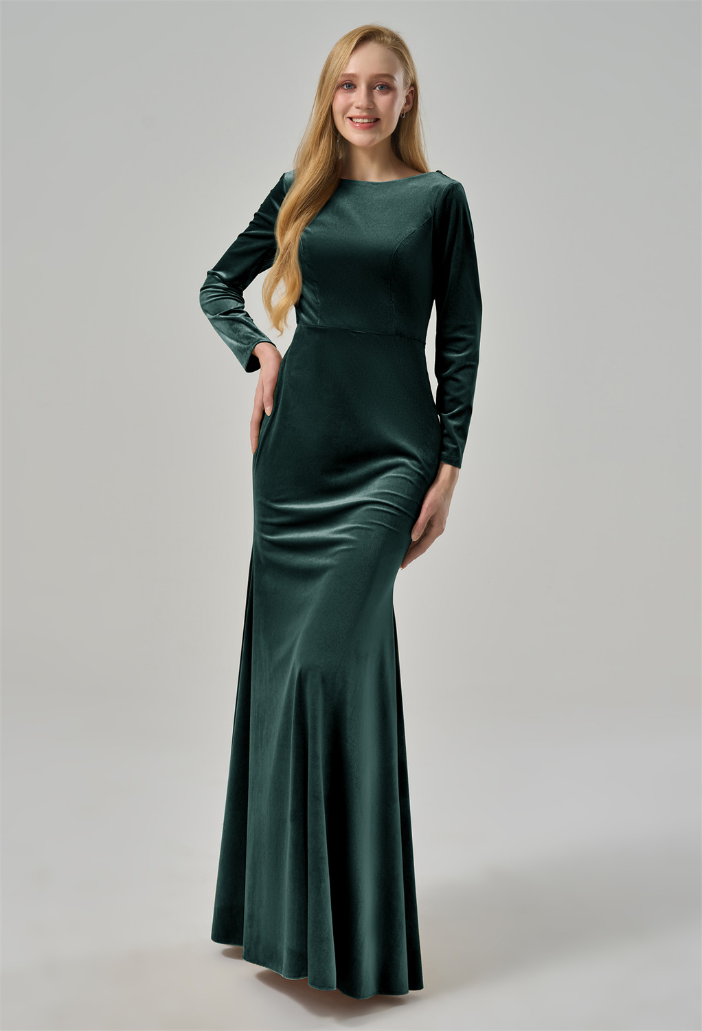 this dress exudes timeless charm. The form-fitting silhouette flows into a graceful mermaid skirt