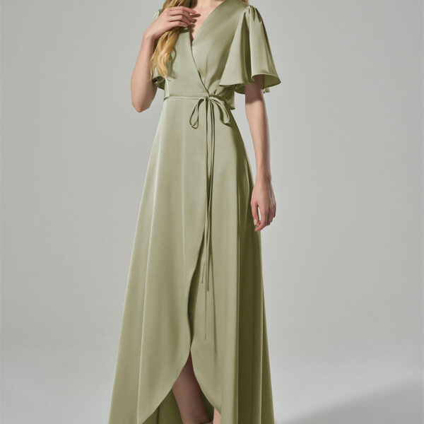 while the flowing fabric creates a graceful silhouette