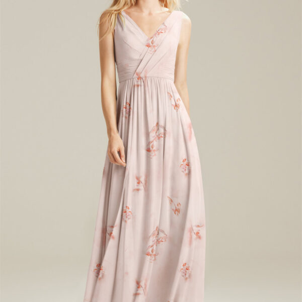 the Gertrude dress offers a beautiful look for a special day. The V-neck of the dress is mirrored at the back