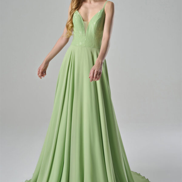 while the flowing chiffon skirt provides a graceful