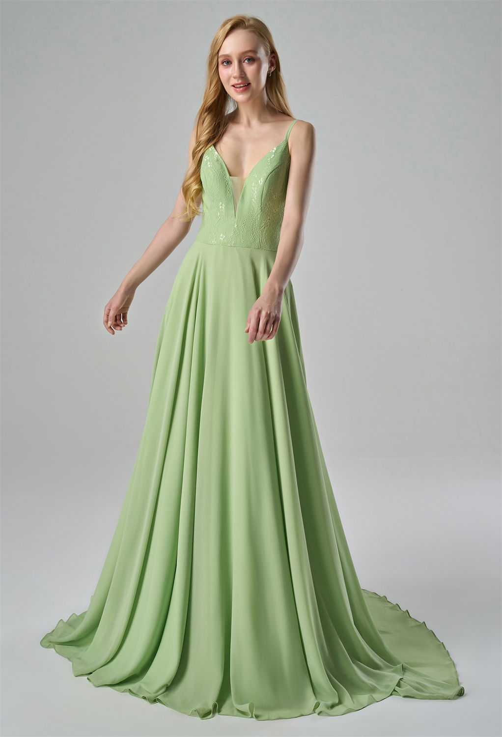 while the flowing chiffon skirt provides a graceful