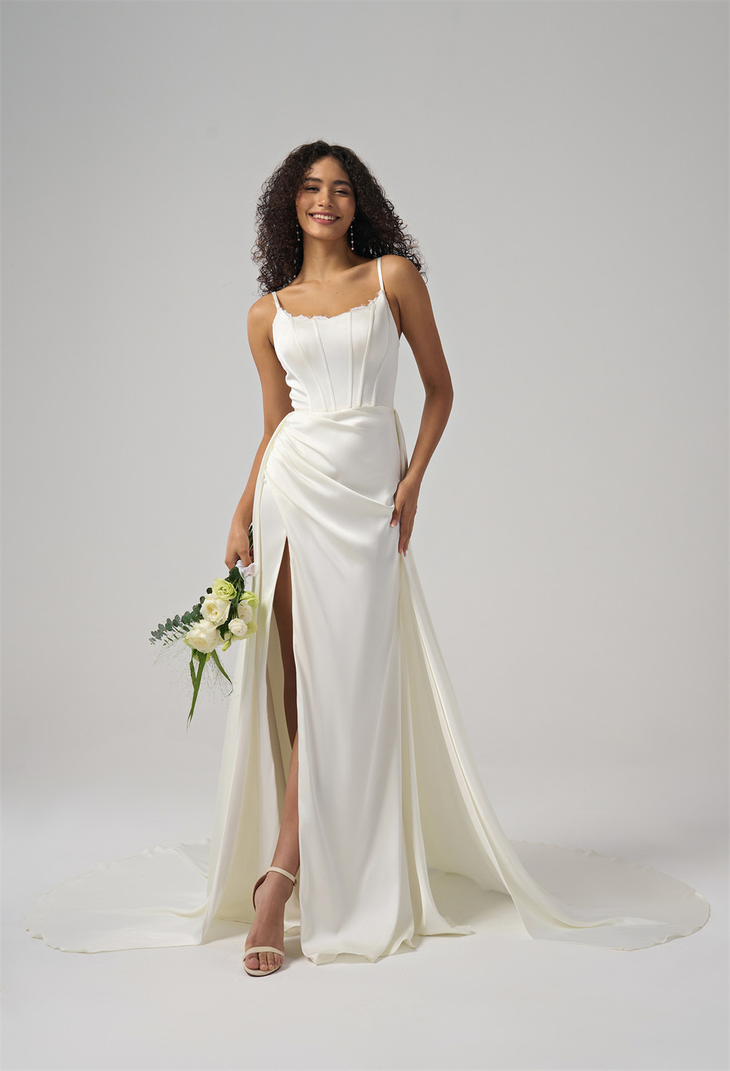crafted from luxurious satin. This A-line gown features a floor-length hem
