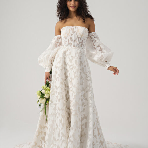 featuring elegant organza in an A-line silhouette. This floor-length gown has a straight neckline