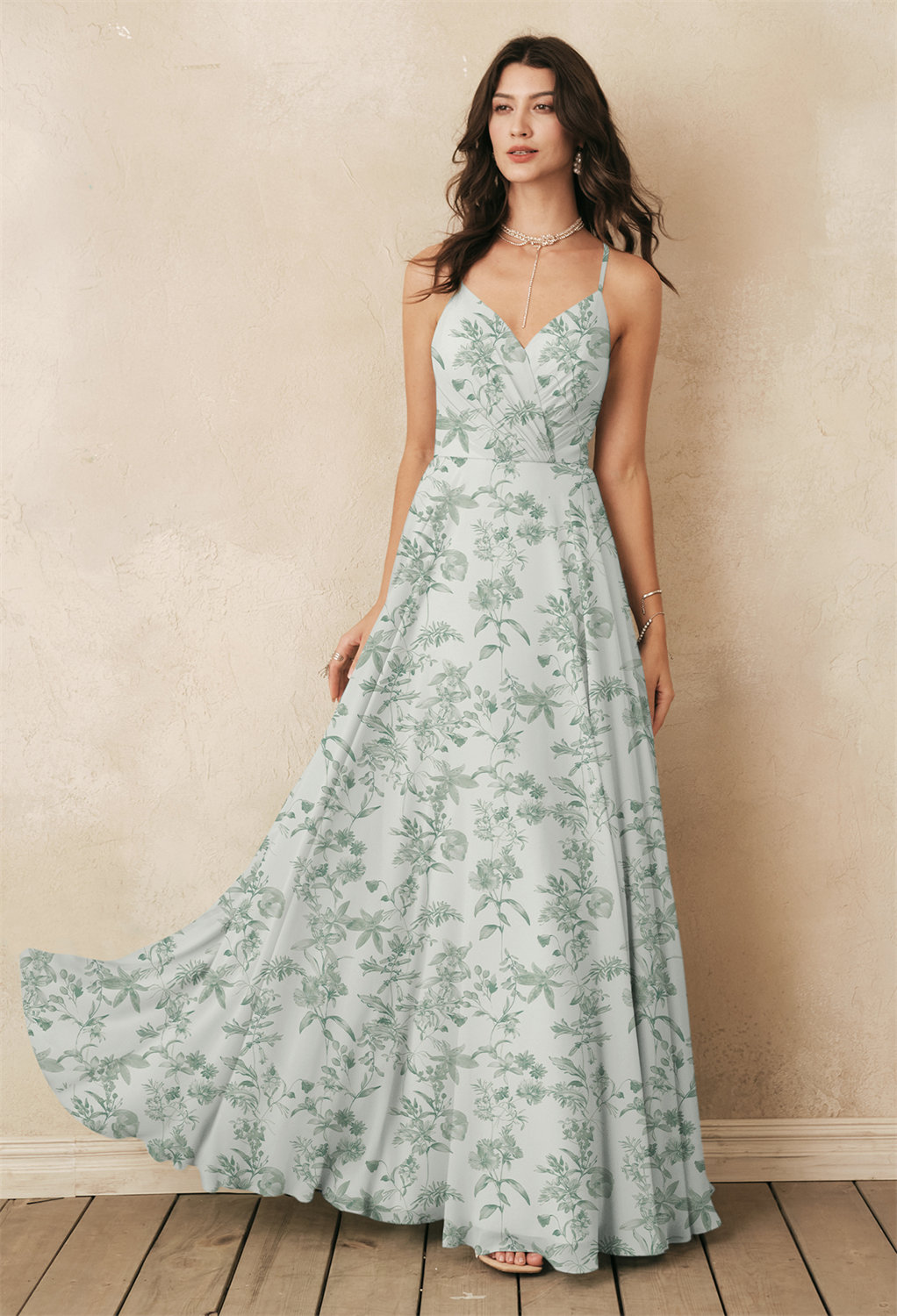 layers of chiffon and a romantic neckline make the floor length Melody dress the perfect choice for the bride looking to create a classic look for her wedding day. The bodice of the gown showcases pretty pleated details that are simply flattering.