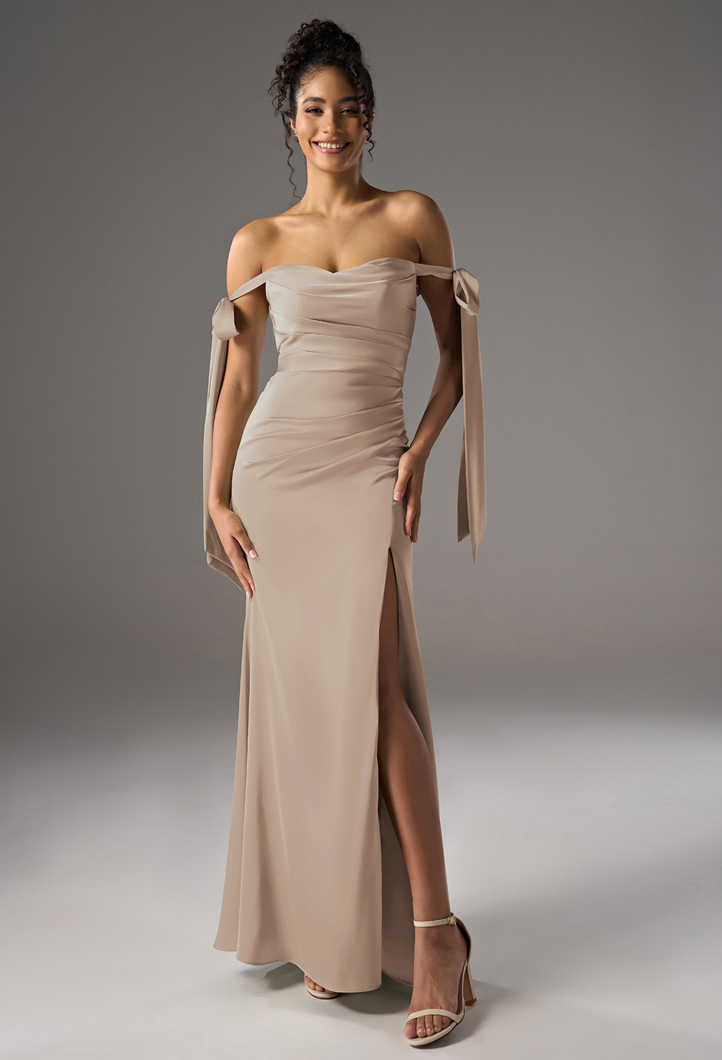 mermaid-style bridesmaid dress with a sweetheart neckline and available in various fabrics like Crystal Satin and Satin Charmeuse. It's perfect for formal weddings and other special occasions. You can customi