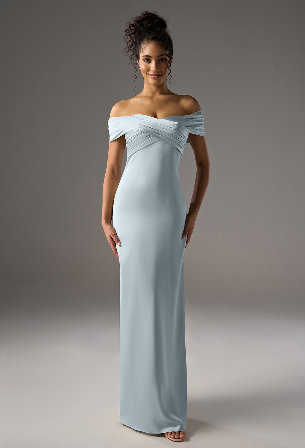 off-the-shoulder dress. It features a simple