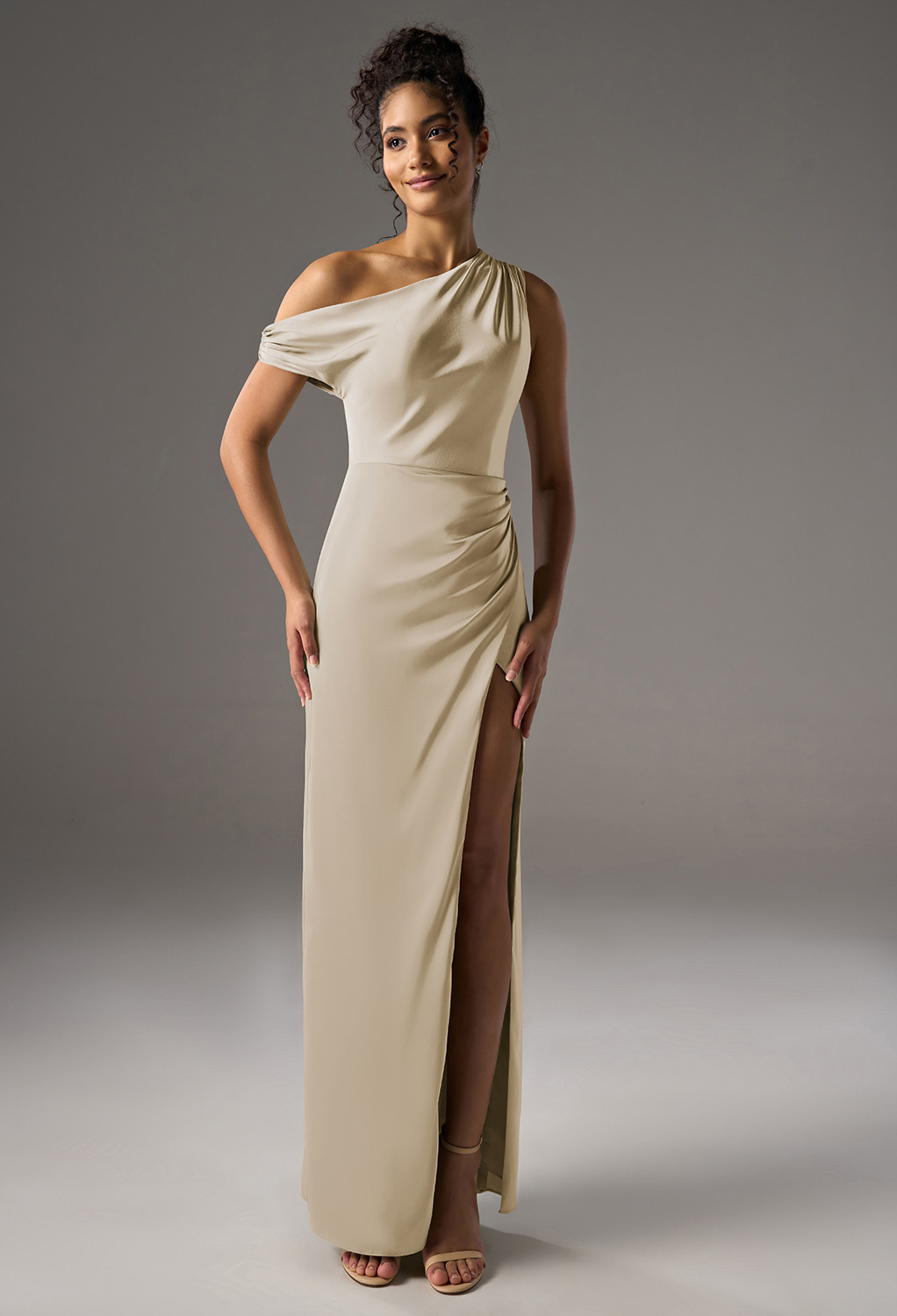 one-shoulder bridesmaid dress made from luxurious satin charmeuse or crystal satin. It is available in a variety of colors and sizes