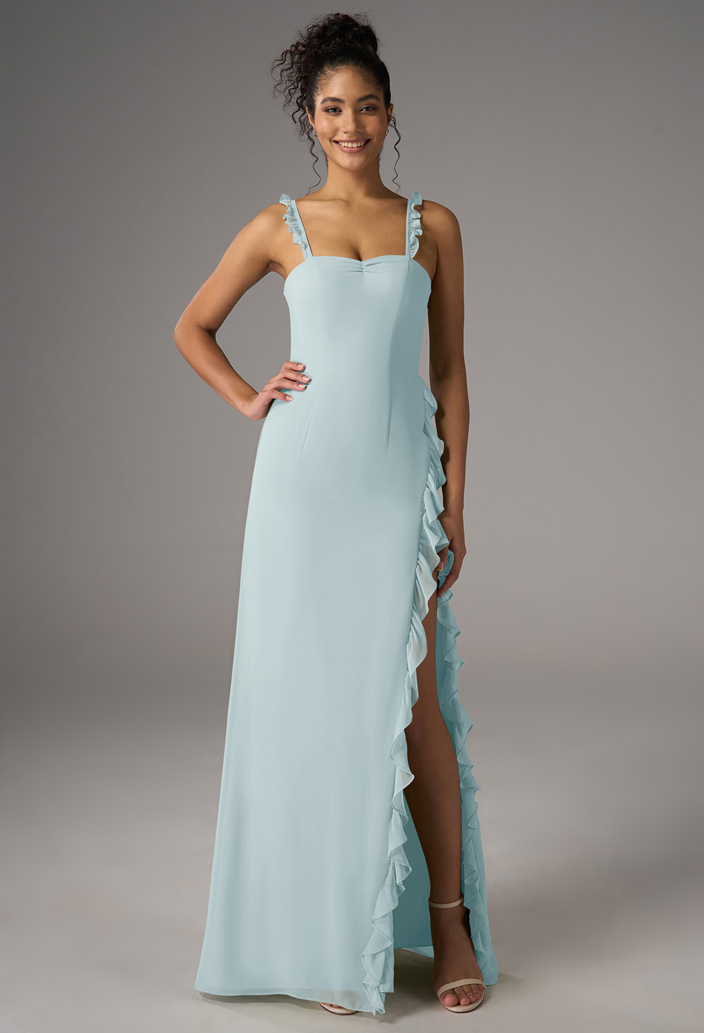 this A-line silhouette features a floor-length hem and a sweetheart neckline. The sleeveless design with spaghetti straps makes it ideal for weddings or elegant soiru00e9es. Step into s