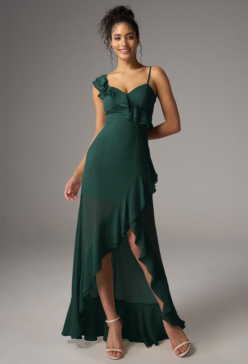 Discover charm with the AW Ameera Dress. This chiffon A-line design features a hi-lo hem and a V-neckline. The sleeveless style with spaghetti straps makes it perfect for garden parties or cocktail events. Step into effortless elegance.