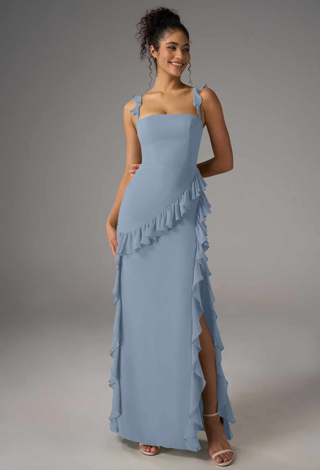 Elevate your elegance with the AW Jaydon Dress. This chiffon A-line gown features a floor-length hem and a square neckline. The sleeveless design with spaghetti straps is perfect for weddings or sophisticated gatherings. Embrace timeless style effortlessl