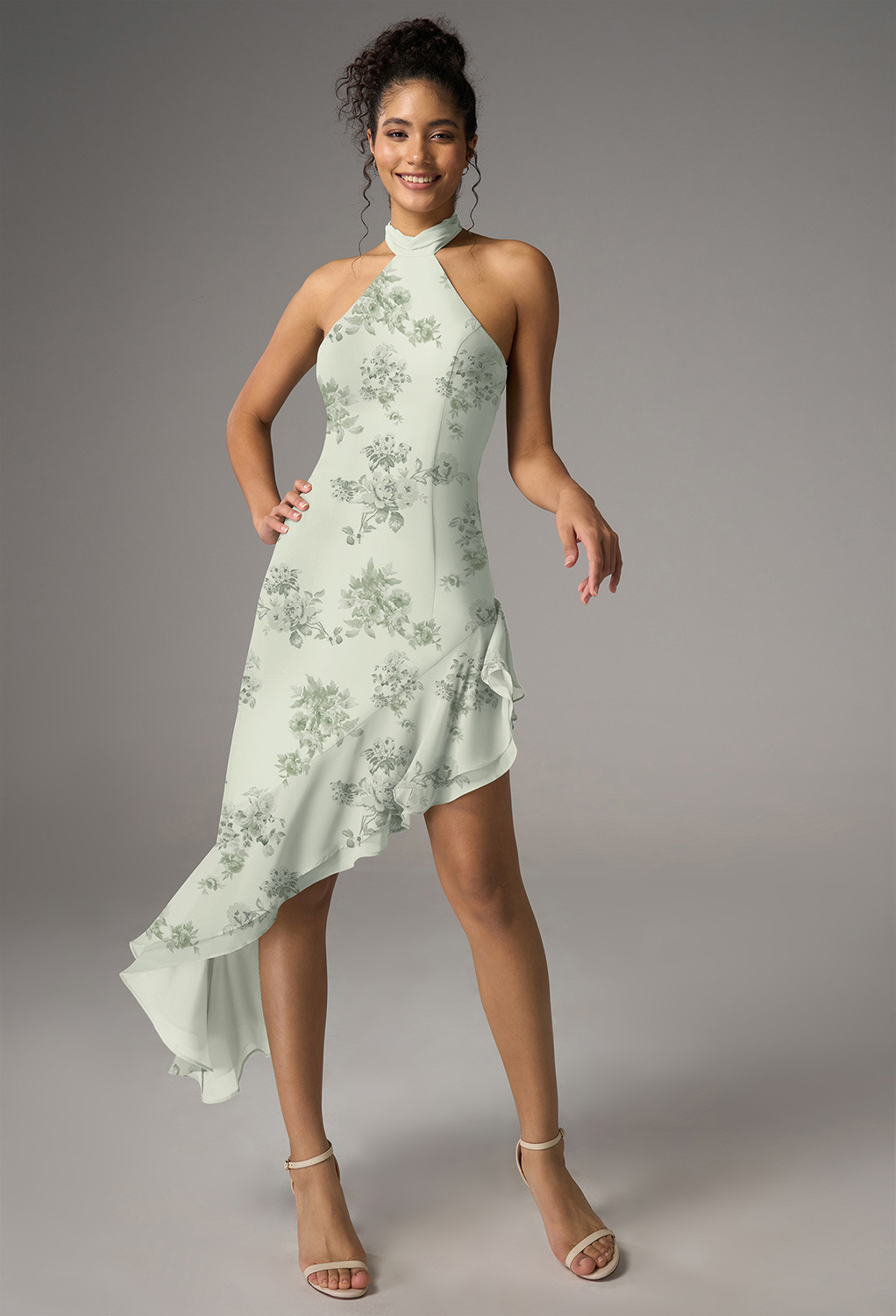 a chiffon A-line design with a tea-length hem and unique turtleneck. The sleeveless