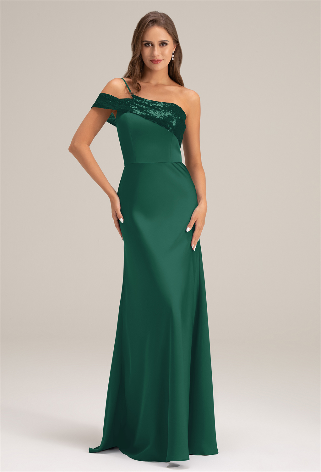 Own shiny moments in our floor-length A-line bridesmaid dress with an asymmetrical neckline. The satin charmeuse fabric with sequins will make you the epitome of style.