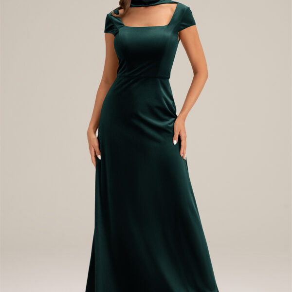 while the floor-length hemline creates a captivating aura.