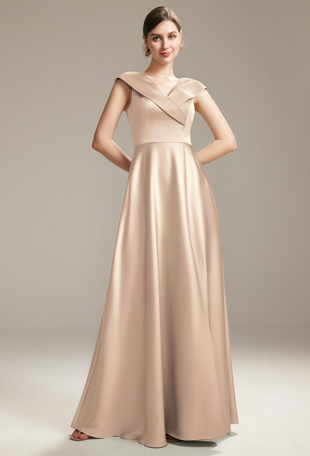 allowing you to glide elegantly with every stride. Its flattering v-neckline is complemented by chic cap sleeves