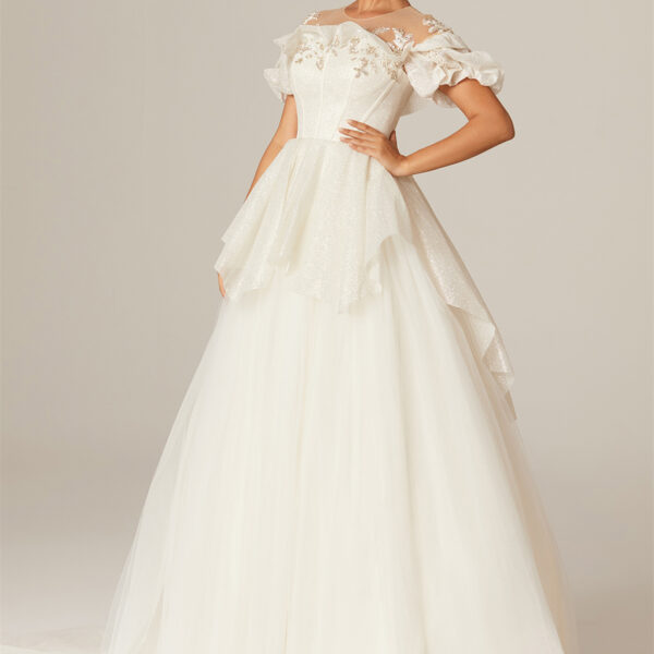 Prepare to walk down the aisle with confidence in our tulle floor-length wedding dress with an A-line cut and U-neckline. The chapel train adds a whimsical and ethereal touch.