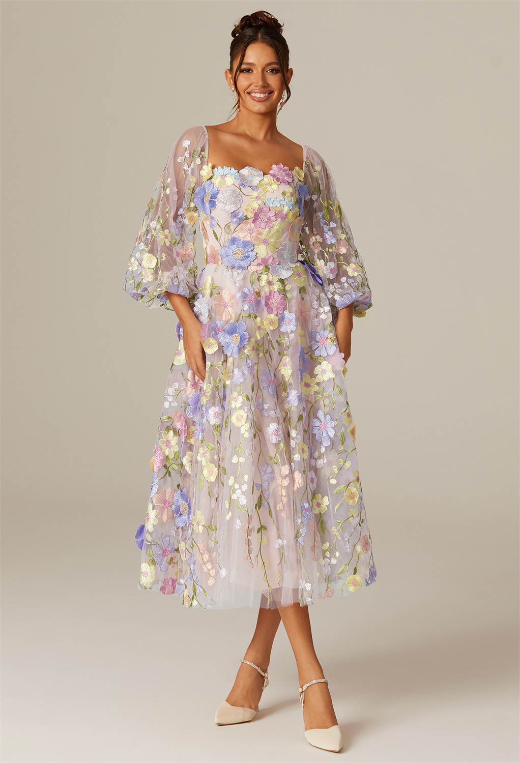 cut in a refined A-line and finished with a sleek straight neckline for a touch of modern romance.