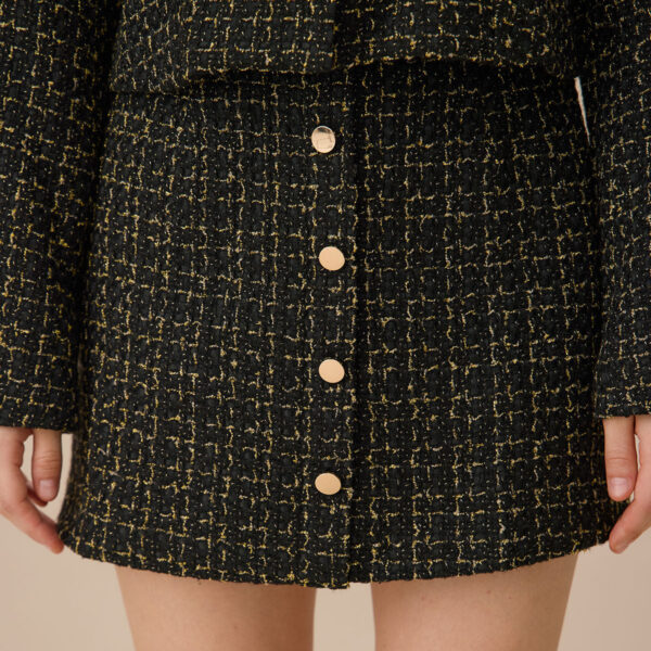 Fabric:This Tweed Skirt is made of Polyester. Polyester is an artificial fiber that feels soft