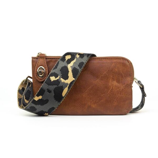 Now you can build your perfect bag! Pick your favorite color Nikki crossbody bag and then pick your favorite style strap to build the perfect bag. All straps are interchangeable!Our beautiful Nikki vegan leather Crossbody  from the Threaded Pear is th