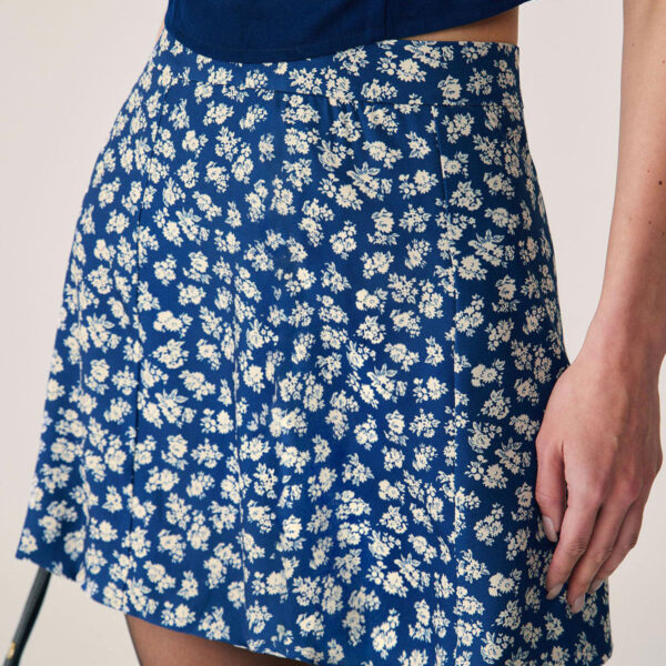 Fabric:This Floral Mini Skirt is made of Polyester and Spandex. Polyester is an artificial fiber that feels soft