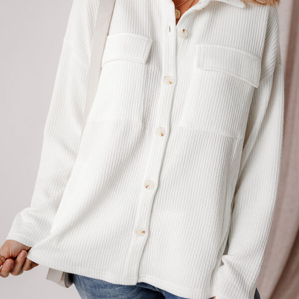 This corduroy jacket brings texture and warmth to your wardrobe. Embrace a timeless and versatile style with its solid color design. The buttoned closure adds a touch of polish and structure. And don't forget the chest pockets for added functionality and