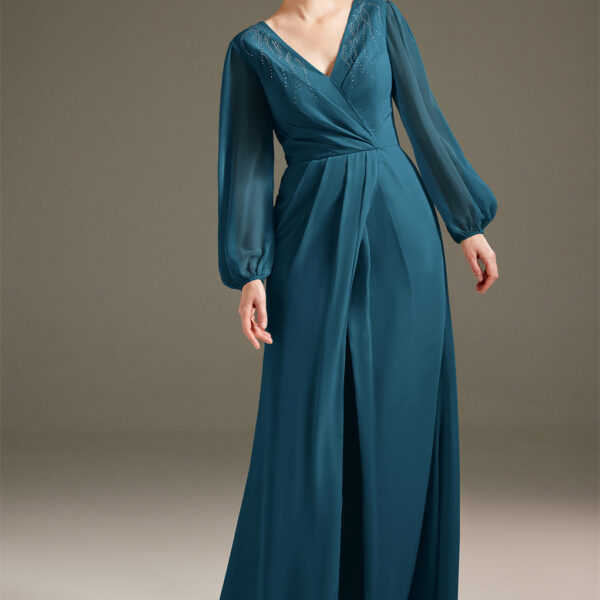 this dress is soft on the skin and guarantees a graceful glide. It's styled as an intricately designed v-neck dress with illusion puff sleeves.