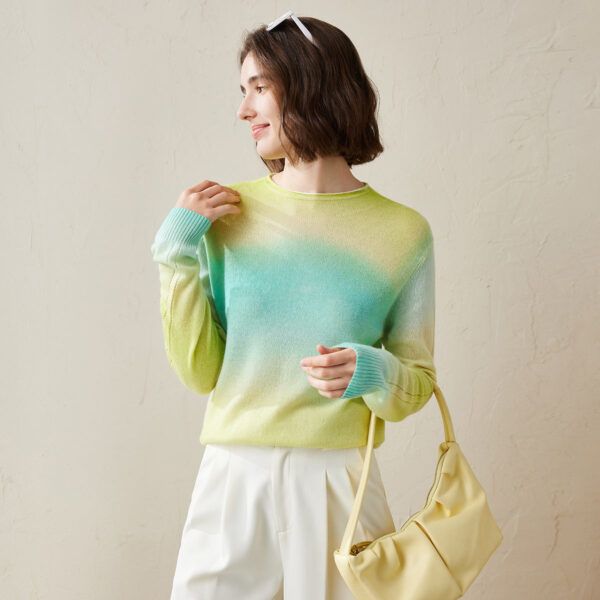 Add a splash of color to your wardrobe with this Gradient Color Knit Sweater. Featuring a soft ombre effect in vibrant hues