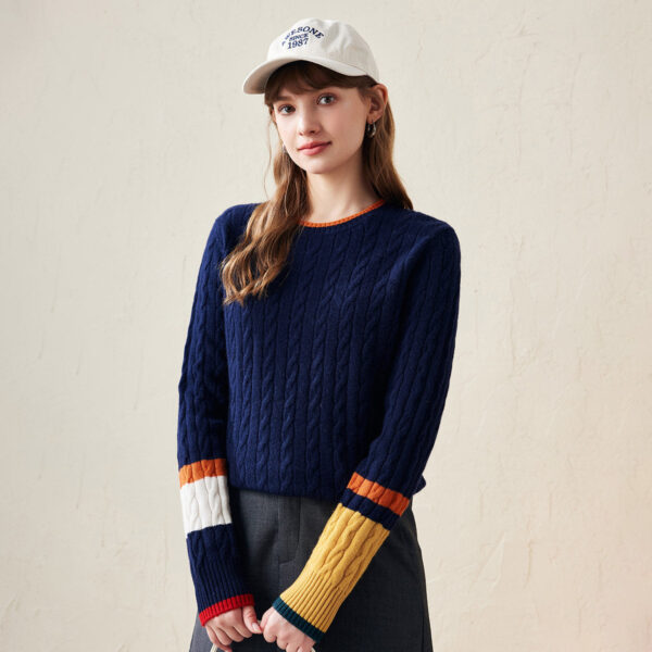 Embrace timeless style with our Colorblock Cable Knit Sweater. Designed for comfort and chic appeal