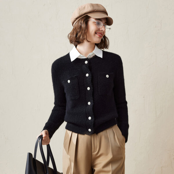 Wrap yourself in warmth and style with this cozy knitted button down cardigan. Perfect for layering over your favorite outfits