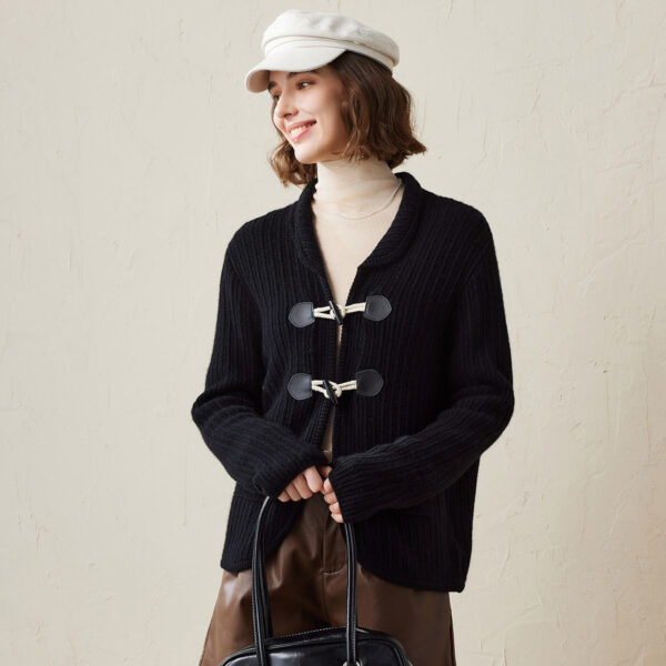 Elevate your layering game with our Cozy Toggle Closure Knit Cardigan. This beautifully crafted cardigan is designed with a ribbed knit texture that adds a touch of sophistication to your winter wardrobe. The standout feature is the unique toggle closure