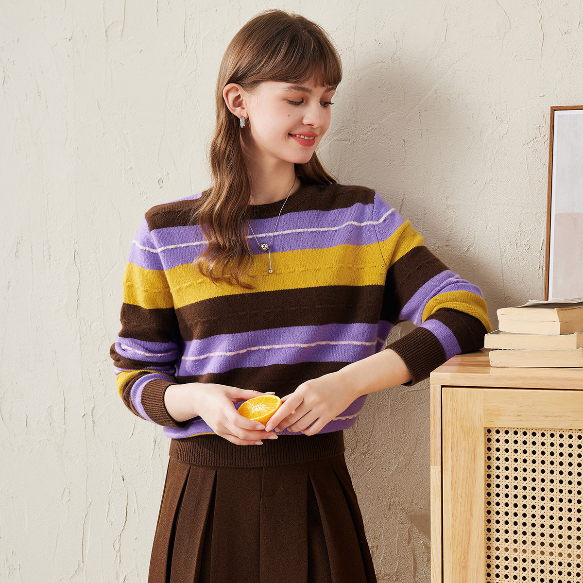 Stay warm and stylish with our Cozy Striped Knit Sweater. This versatile piece features a classic crew neck and long sleeves