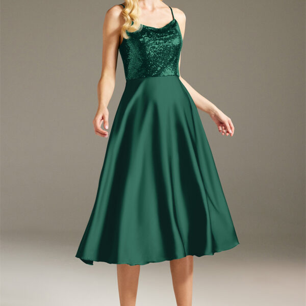it is styled as an A-line tea-length dress with a blooming glow that can't be ignored. It features a scoop neckline