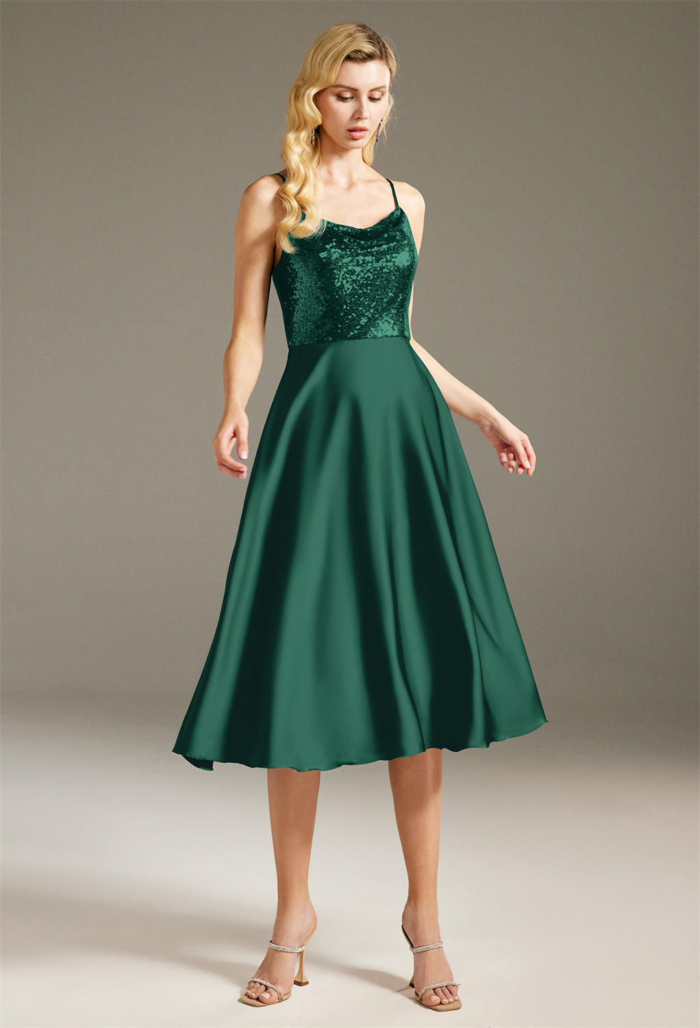 it is styled as an A-line tea-length dress with a blooming glow that can't be ignored. It features a scoop neckline