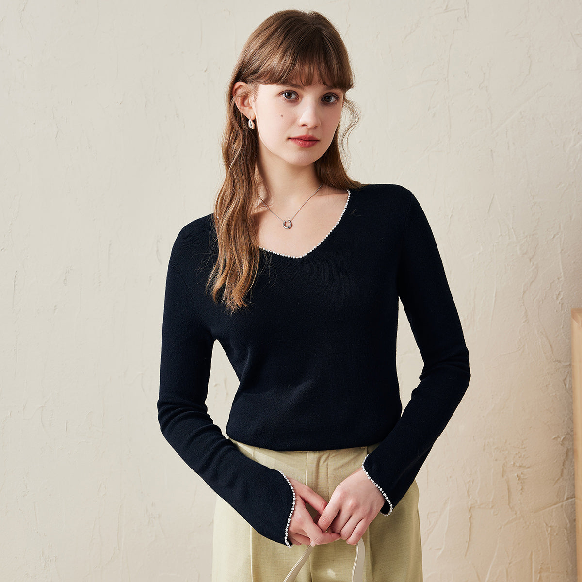 Upgrade your wardrobe with our Elegant V-Neck Sweater