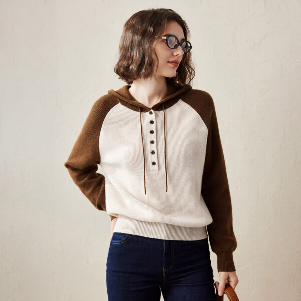 Embrace casual comfort and timeless style with this Color Block Button-Up Hoodie. This versatile hoodie combines classic knitwear with a sporty hoodie design for the perfect blend of style and function. The button-up front adds a chic touch