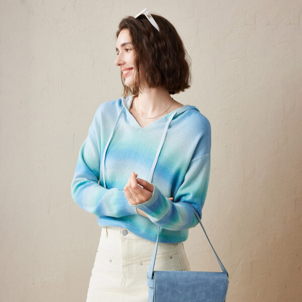 Embrace comfort and style with our Gradient Color Knit Hoodie. Designed with a mesmerizing gradient color pattern
