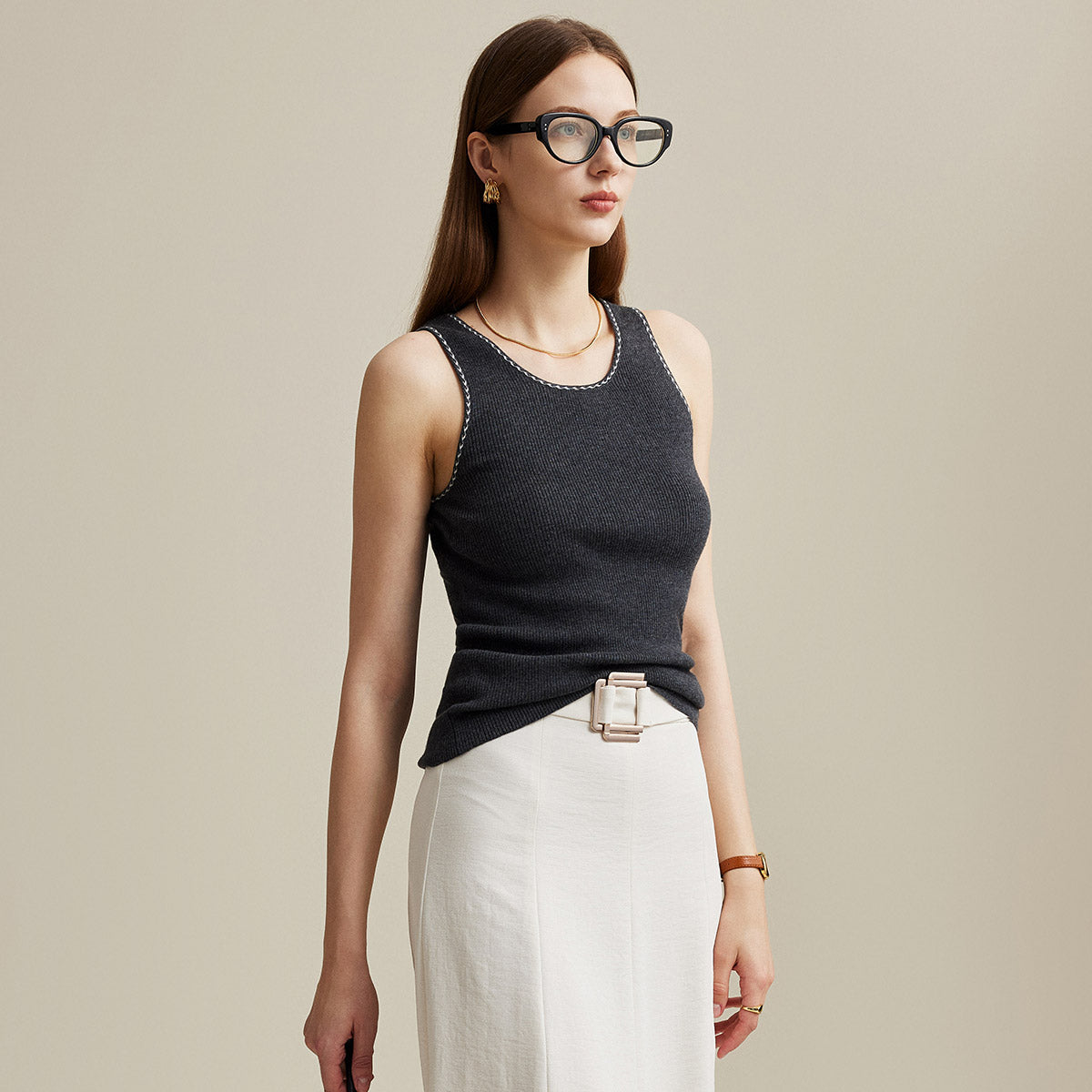 Elevate your everyday style with our Sleek Ribbed Knit Tank Top. Designed for the modern woman