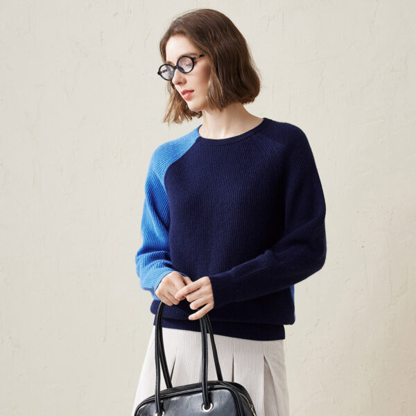 Add a vibrant twist to your wardrobe with this Color Block Soft Knit Sweater. This cozy and stylish sweater features a unique two-tone color block design
