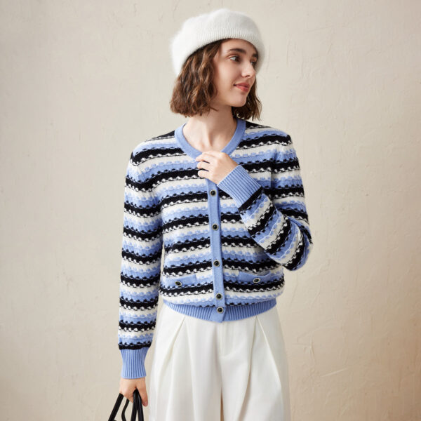 This Striped Knitted Button Up Cardigan is a stylish and cozy addition to any wardrobe. With its vibrant and playful stripes in various shades