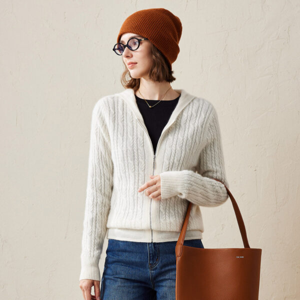 Experience the ultimate blend of comfort and style with our Luxurious Cable Knit Cashmere Hoodie. This zip-up hoodie is crafted from premium cashmere
