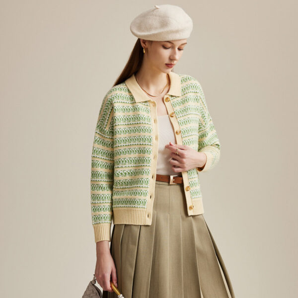 Elevate your style with our Vintage-Inspired Striped Knit Cardigan. This charming piece blends classic design with modern comfort