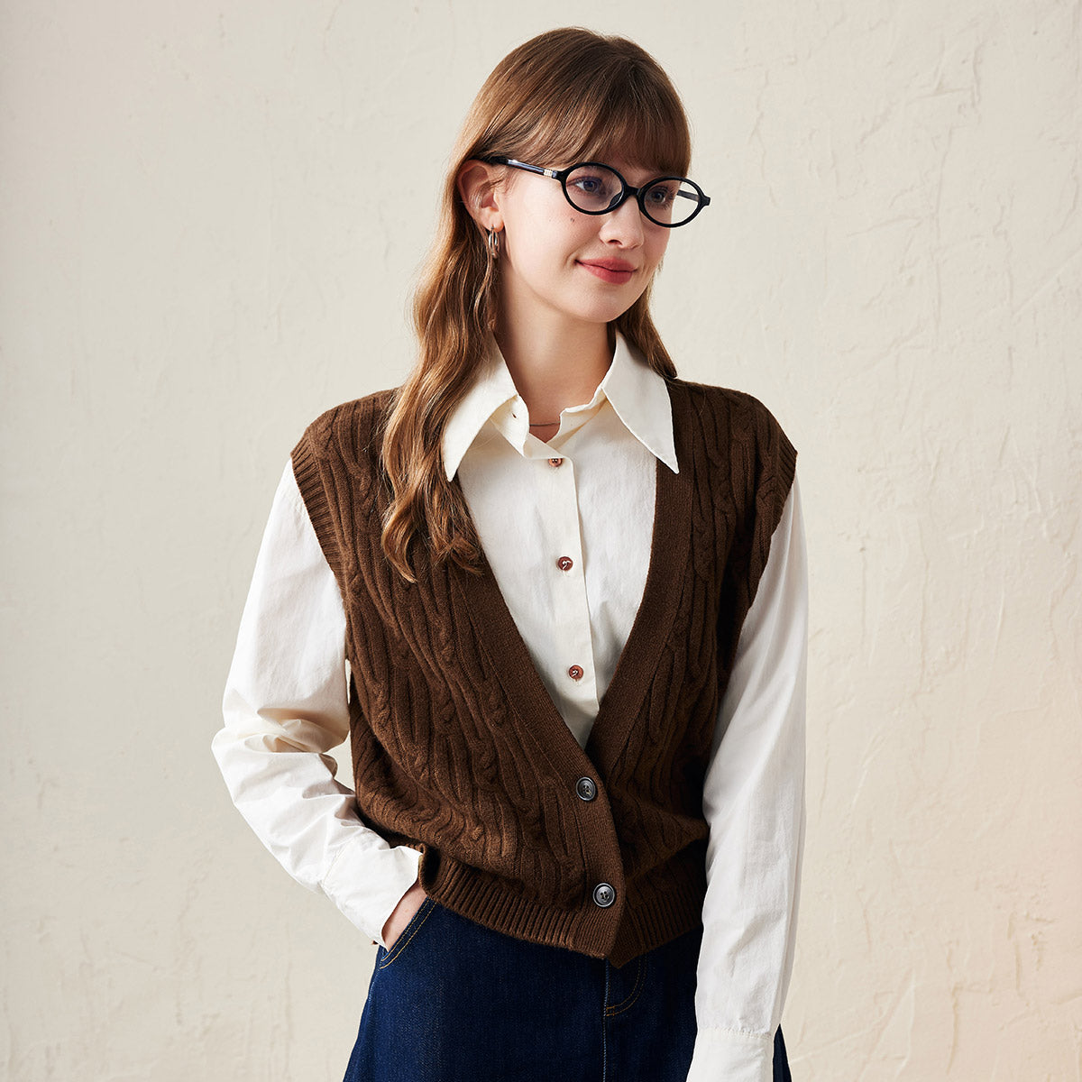 Fabric: 100% Wool Timeless Cable Knit Design: The vest features a classic cable knit pattern