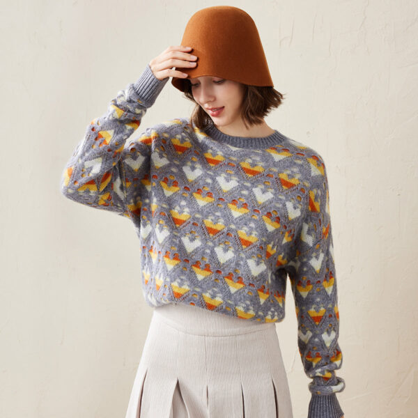 Add a pop of color and playfulness to your wardrobe with our Pastel Heart Knit Sweater. Featuring a unique heart shaped open knit pattern and delicate pastel hues