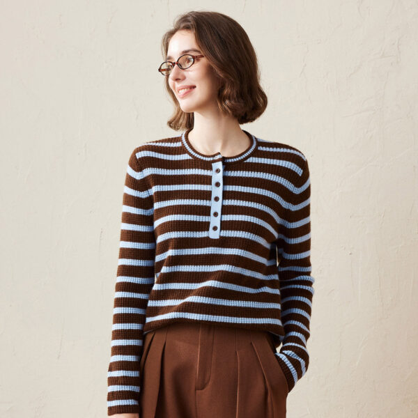 Stay cozy and stylish with our Cashmere Striped Knit Henley Sweater. This timeless piece is designed for both comfort and flair