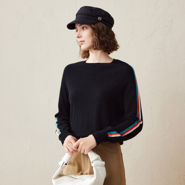 Elevate your casual wardrobe with this ultra soft knit sweater featuring bold