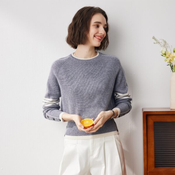 Elevate your wardrobe with our 100% Cashmere Classic Striped Sleeve Round Neck Sweater. This beautifully crafted sweater combines timeless design with luxurious comfort