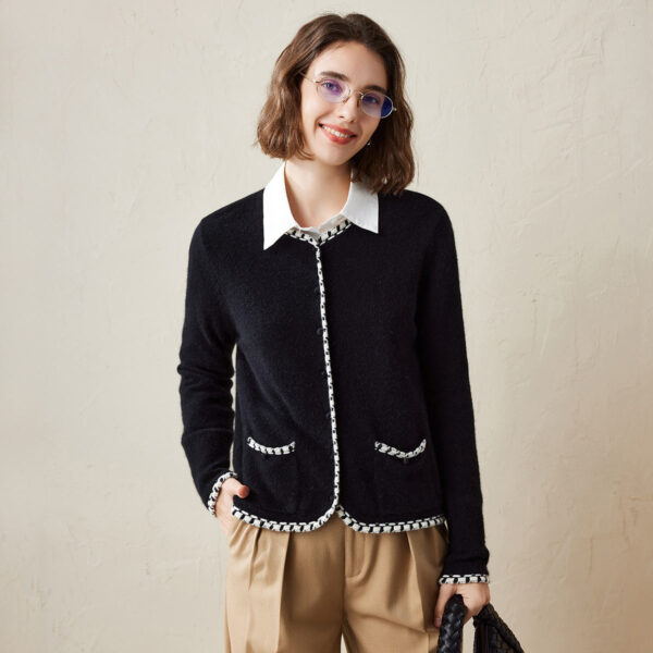 Elevate your wardrobe with this timeless cardigan featuring elegant contrast trim detailing. Crafted from a soft