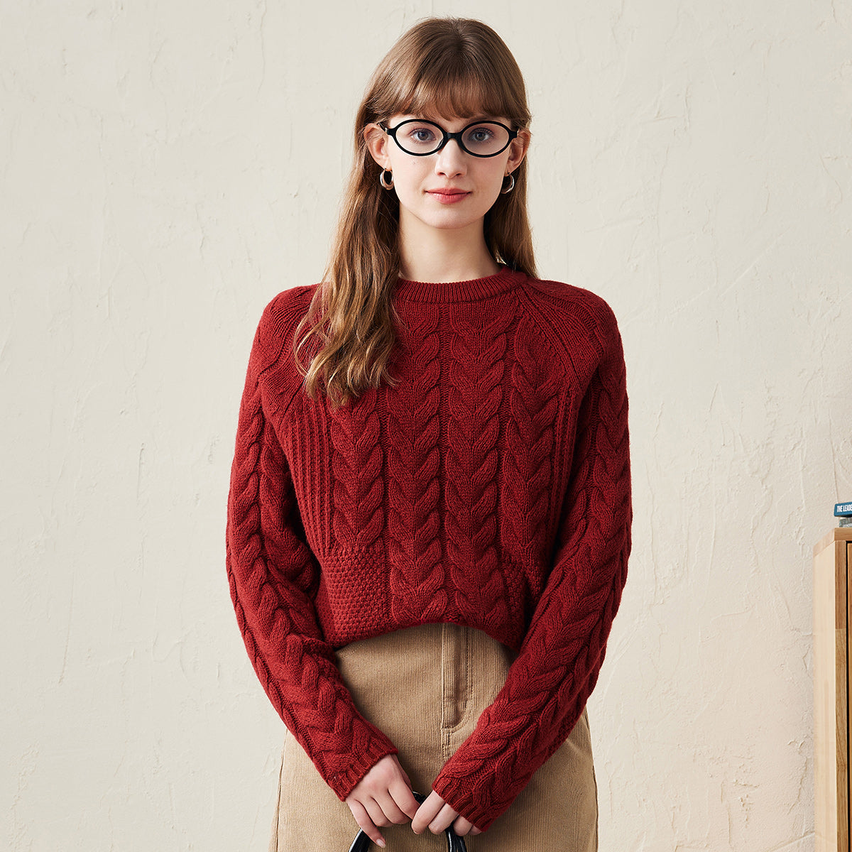 Wrap yourself in warmth and style with our Cozy Cable Knit Sweater. This sweater features a classic cable knit design