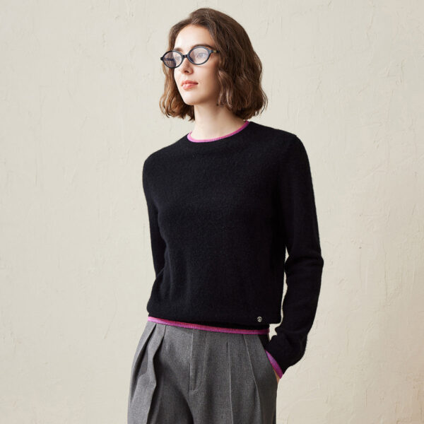 Elevate your wardrobe with this chic Women's Color-Accented Soft Knit Pullover Sweater. This sweater combines timeless elegance with a playful pop of color