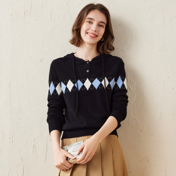 This stylish Women's Argyle Knit Hoodie combines classic design with modern comfort. The argyle pattern across the chest adds a timeless touch